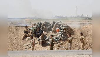 Islamic State presses assault on Syrian border town, Kurds warn Turkey