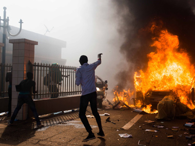 Protesters storm Burkina Faso's parliament and set it ablaze Protesters storm Burkina Faso's parliament and set it ablaze