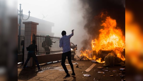 Protesters storm Burkina Faso's parliament and set it ablaze