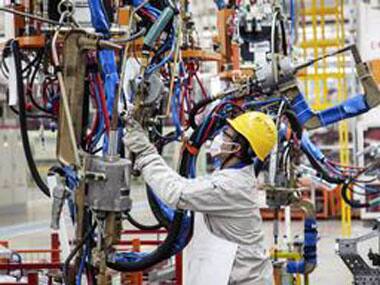 An employee works at the production line of an automobile factory in China. Reuters