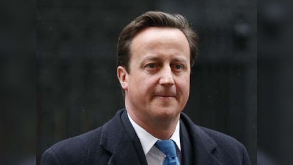 British PM David Cameron makes surprise visit to Afghanistan, pledges support for new President