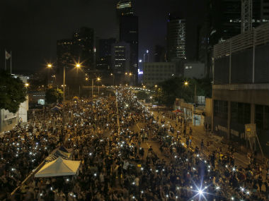 Protesters press Hong Kong leader to quit, China tells US to back off Protesters press Hong Kong leader to quit, China tells US to back off