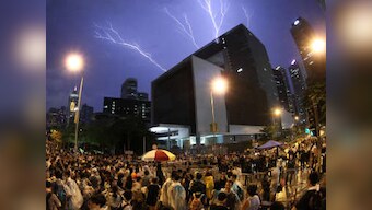 Hong Kong: Police arrest 19 as mobs attack pro-democracy protestors 