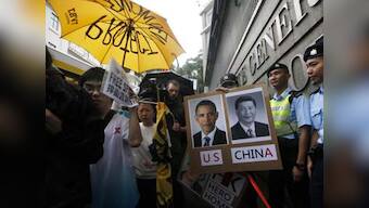 Hong Kong police start removing barricades, protesters caught unaware