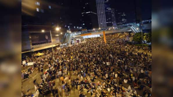 Hong Kong civil servants return to work as pro-democracy protests thin