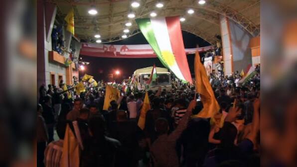 Iraqi Kurds arrive in Syria to help fight Islamic State militants