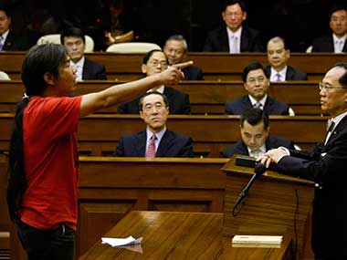 Surveillance society: Hong Kong's 'Che' points at collapsing elitist facade of his city Surveillance society: Hong Kong's 'Che' points at collapsing elitist facade of his city
