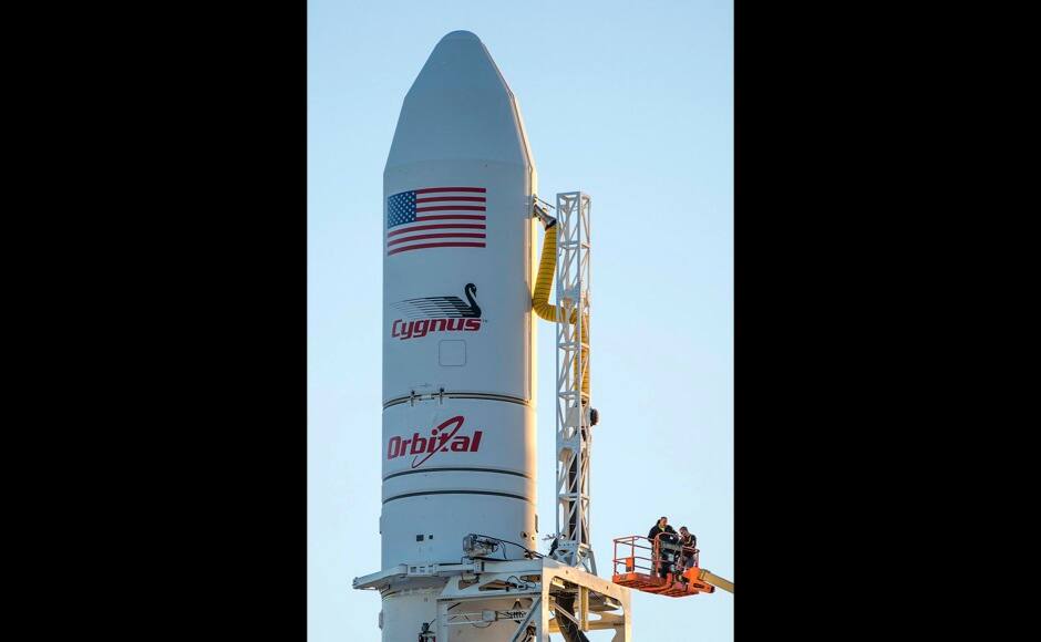 Orbital Sciences Corporation's Antares rocket and Cygnus cargo spacecraft are prepared for launch at the Mid-Atlantic Regional Spaceport on Wallops Island, Virginia in this NASA handout picture released October 27, 2014. Liftoff is scheduled for 18:45 EDT (22:45 UTC) on Monday. This will mark the fourth Cygnus mission to the International Space Station. REUTERS/NASA/Handout via Reuters 