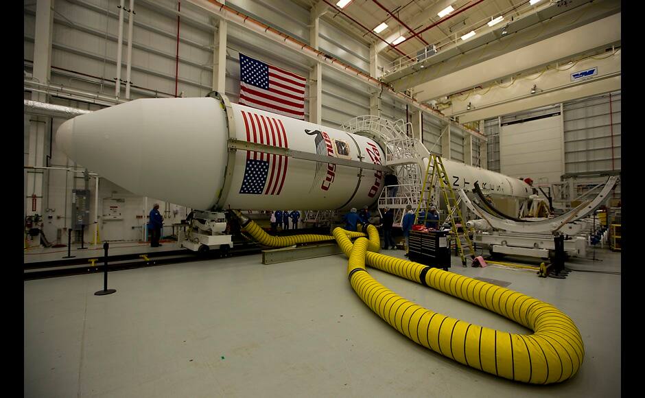 The Orb-3 mission?s payload fairing (the casing around the spacecraft) is installed on Orbital Sciences Corp.?s Antares rocket on the evening of October 23, 2014, at the Horizontal Integration Facility at NASA?s Wallops Flight Facility in Virginia, as seen in this handout photo from NASA. An unmanned Antares rocket exploded seconds after liftoff from a commercial launch pad in Virginia on Tuesday, marking the first accident since NASA turned to private operators to deliver cargo to the International Space Station, but officials said no one was hurt. REUTERS