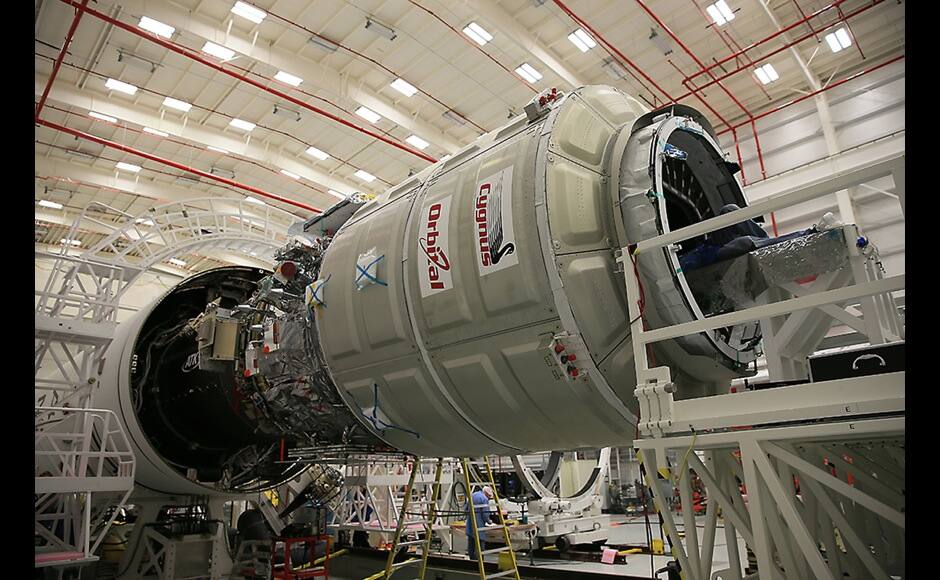 Orbital Sciences Corp. completes a final cargo load of the Cygnus cargo spacecraft in preparation for launch to the International Space Station on October 23, 2014, at the Horizontal Integration Facility at NASA?s Wallops Flight Facility in Virginia, as seen in this handout photo from NASA. An unmanned Antares rocket exploded seconds after liftoff from a commercial launch pad in Virginia on Tuesday, marking the first accident since NASA turned to private operators to deliver cargo to the International Space Station, but officials said no one was hurt. REUTERS