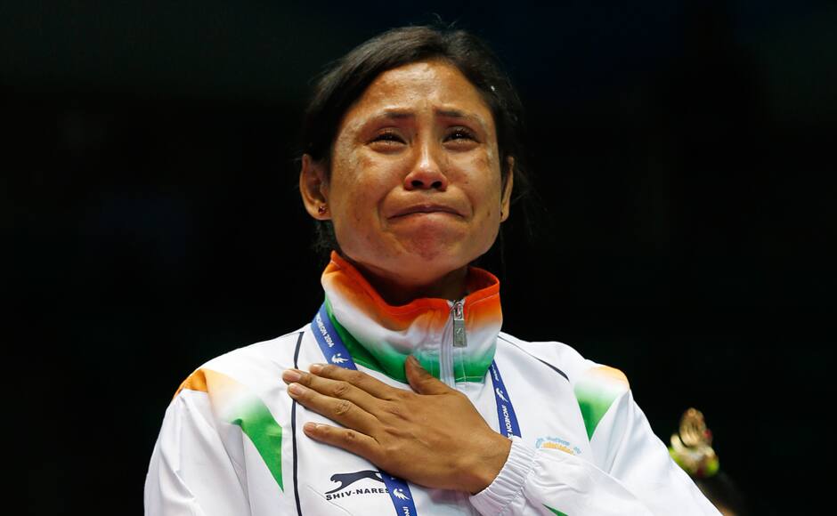 India's boxer Sarita Devi refused to accept her bronze medal at the prize giving ceremony of the 57-60 kg (Lightweight) category. The lightweight boxer was left in tears yesterday after she was adjudged to have lost despite a dominating performance against South Korea's Jina Park. AP