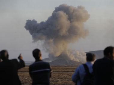 Kurds hold off ISIS militants in Syria's border town Kobani Kurds hold off ISIS militants in Syria's border town Kobani