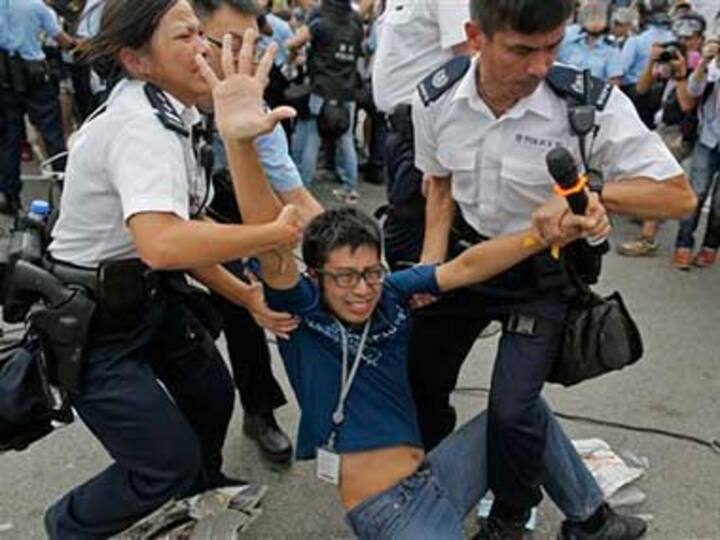 Residents clash with protesters in Hong Kong Residents clash with protesters in Hong Kong