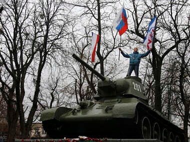 Russian tanks, artillery, combat troops entering east Ukraine: NATO 