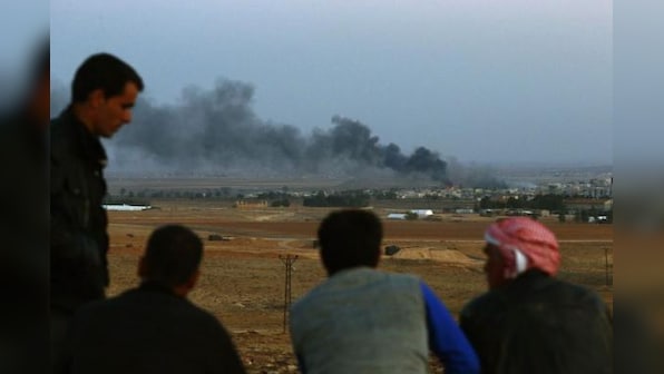 Kurds reject Erdogan report of deal with Syrian rebels to aid besieged Kobani