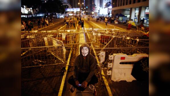 Hong Kong govt may resume on Monday, but protests will go on