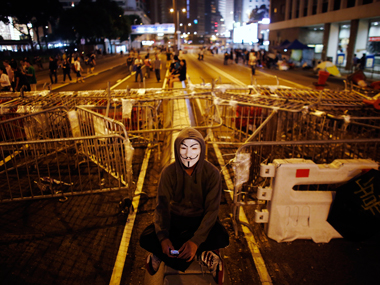 Hong Kong police clear tents at main protest site Hong Kong police clear tents at main protest site