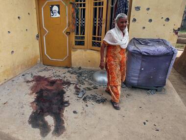 Blood-stained courtyard after a villager was killed in Pakistan firing on Monday. Reuters