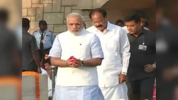 Ahead of Swachh Bharat launch, PM Modi pays tributes to Gandhiji