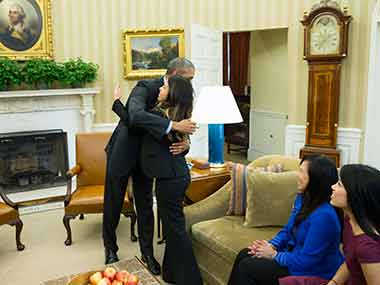 Nurse, now Ebola free, receives a hug from Barack Obama Nurse, now Ebola free, receives a hug from Barack Obama