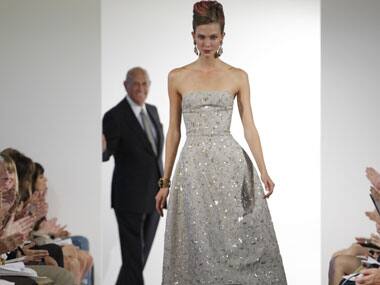 Oscar De La Renta preparing to walk the runway at a show. AP.