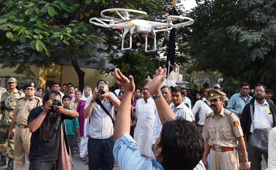 Police using a 'Drone' to keep a watch on a Muharram procession in tension hit Trilokpuri in New Delhi on Tuesday. PTI 