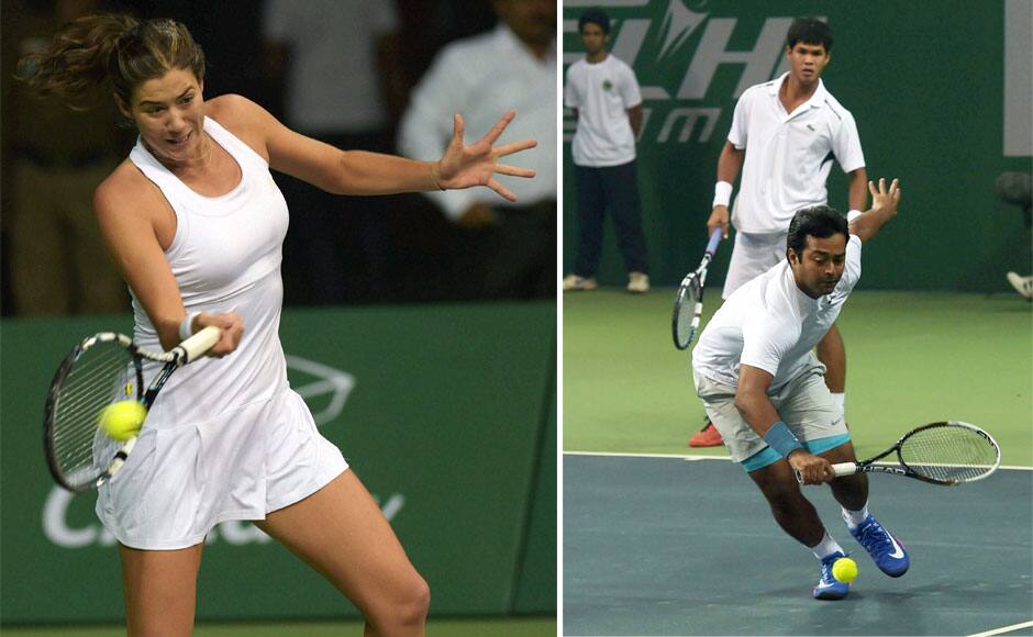 Delhi took a 2-1 lead as (L) Punjabs' Garbine Muguruza lost to Jelena Jankovic in nine-point tie-breaker 6-5 (3) in the women's singles . (R) But Punjab hit back to make it 2-2 as Leander Paes and Somdev Devvarman edged Kevin Anderson and Sanam Krishan Singh 6-4 in the Men's doubles. PTI
