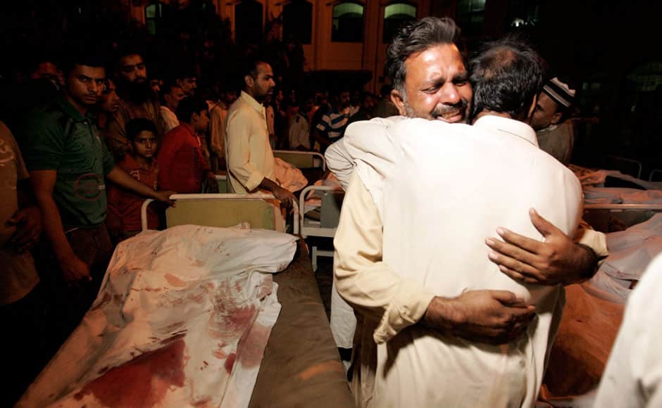 A Pakistani mourns the death of a relative who was killed in a suicide bomb attack in Wagah border near Lahore November 2, 2014. At least 45 people were killed on Sunday when a suicide bomber blew himself up on the Pakistani-Indian border, police said, just after a daily ceremony when troops from both sides simultaneously lower the two nations' flags. REUTERS