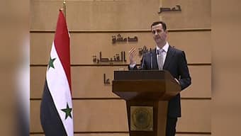 Syrian President Assad says 'real' cooperation needed to crush Islamic State
