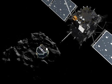 An artist rendering by the ATG medialab depicting lander Philae separating from Rosetta mother spaceship and descending to the surface of comet 67P/Churyumov-Gerasimenko. AP