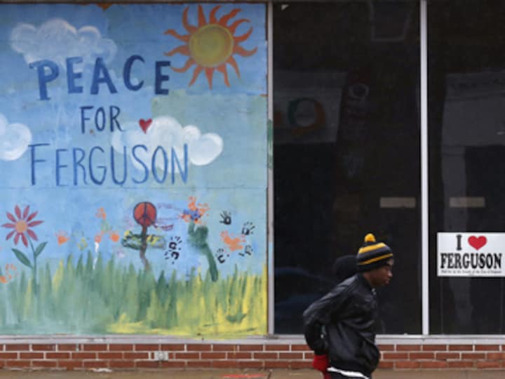 Ferguson on edge awaiting grand jury verdict in Michael Brown's shooting