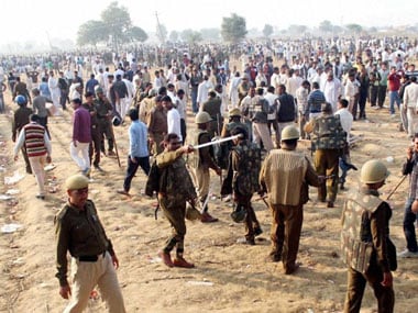 Followers of Rampal are gradually coming out of the ashram. PTI