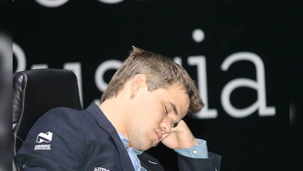 Photos: Sleepy? No problem, world champion Carlsen still draws with Anand