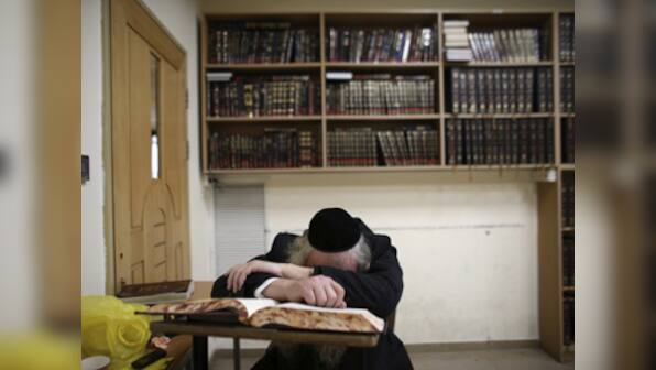 Jerusalem mourns as Israel vows harsh response to synagogue attack