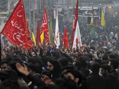 Kashmiri Shiite Muslims beat their chests as they participate in a Muharram procession in Srinagar, India on Monday. AP 