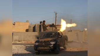 Violence escalates in Libya, Bombs go off in city housing assembly, govt