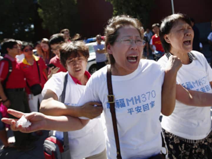 Families furious over report which said MH370 to be declared 'lost'