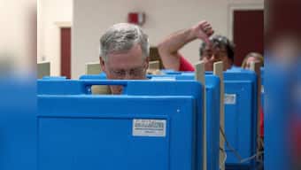 Viral pic: Senate leader Mitch McConnell photobombed by voter 