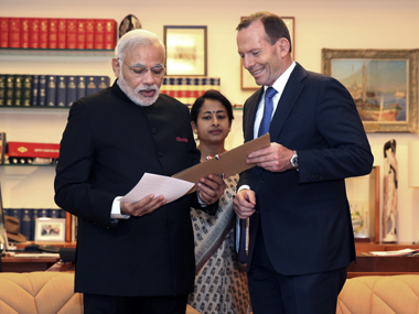PM Modi, Oz PM Abbott agree on closer cooperation on defence and trade in Australia PM Modi, Oz PM Abbott agree on closer cooperation on defence and trade in Australia