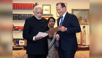 PM Modi, Oz PM Abbott agree on closer cooperation on defence and trade in Australia