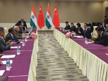 PM Narendra Modi (left) during his meeting with Chinese Premier Li Keqiang. Courtesy: Twitter