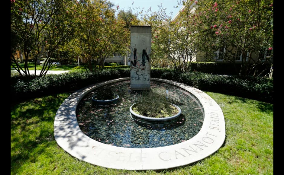 A piece of the Berlin Wall is seen at Chapman University in Orange, California September 17, 2014. On November 9, Germany will celebrate the 25th anniversary of the fall of the Berlin Wall. To mark the event Reuters Photographers around the world captured images of segments of the wall, which are kept as monuments in many countries from Taiwan to South Africa and Costa Rica. The Berlin Wall, which divided West Berlin from the communist East after it was built in 1961, was the most potent symbol of the Cold War. At least 136 people were killed or died at the Wall, most of them while trying to escape. On November 9, 1989, following huge protests in East Berlin the wall was breached and thousands of people poured into West Berlin. Picture taken September 17, 2014. REUTERS/Mike Blake (UNITED STATES - Tags: SOCIETY ANNIVERSARY) ATTENTION EDITORS - PICTURE 25 OF 32 FOR WIDER IMAGE STORY 'THE BERLIN WALL AROUND THE WORLD' SEARCH '25 BERLIN' FOR ALL IMAGES - RTR4CLPT