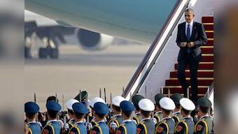 Obama starts his Asian diplomatic tour, arrives in Beijing