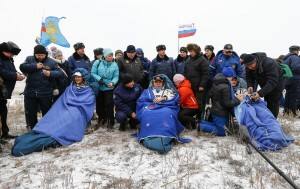 The ISS crew of Gerst, Surayev and Wiseman rest after landing in a remote area near the town of Arkalyk in northern Kazakhstan. Reuters