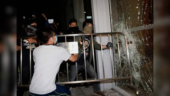 Hong Kong: Clashes erupt as protesters attempt to break into city's legislature