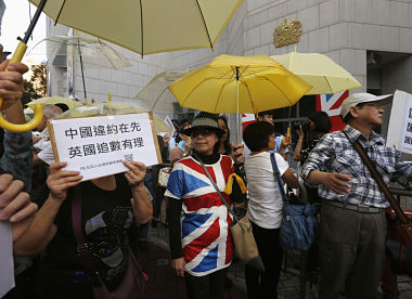 Hong Kong: Pro-democracy activists blame UK, protest outside consulate Hong Kong: Pro-democracy activists blame UK, protest outside consulate