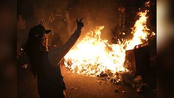Ferguson shooting: 12 buildings torched as protests intensify