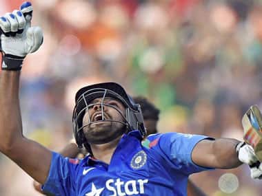 Rohit Sharma celebrates his double century during the 4th ODI cricket match against Sri Lanka in Kolkata on Thursday. PTI 