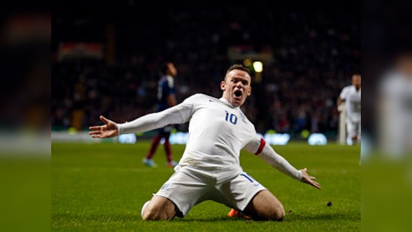 Rooney nears record as England sink Scotland 3-1 