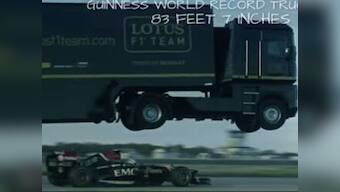 Just for fun: Semi-truck breaks world record by jumping over speeding F1 car